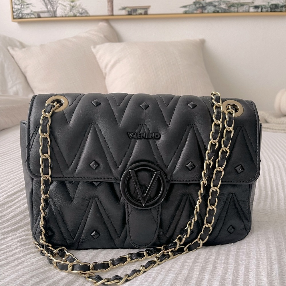 Bought off The Real Real in 2019! Selling bc I am moving and need to down size !